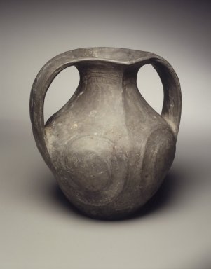  <em>Double-Handled Vessel</em>, 3rd century B.C.E.-3rd century C.E. Gray earthenware with burnished surface and incised decoration, 8 1/2 x 8 7/8 x 6 3/4 in.  (21.6 x 22.5 x 17.1 cm). Brooklyn Museum, Gift of Peter W. Scheinman, 2000.125. Creative Commons-BY (Photo: Brooklyn Museum, 2000.125_transp4788.jpg)
