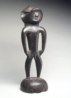 Bassa. <em>Mortar with Lid in the Form of a Man</em>, early 20th century. Wood, glass beads, 8 x 4 x 3 in.  (20.3 x 10.2 x 7.9 cm). Brooklyn Museum, Gift of Blake Robinson, 2000.38.4a-b. Creative Commons-BY (Photo: Brooklyn Museum, 2000.38.4a-b_transp3142.jpg)