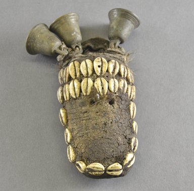 Loma. <em>Personal Miniature Mask</em>, early 20th century. Wood, copper alloy, cotton cloth, fur, including bells: 6 1/2 x 3 3/4 x 1 7/8 in.  (16.5 x 9.5 x 4.8 cm). Brooklyn Museum, Gift of Blake Robinson, 2000.70.3. Creative Commons-BY (Photo: Brooklyn Museum, 2000.70.3_front_PS5.jpg)