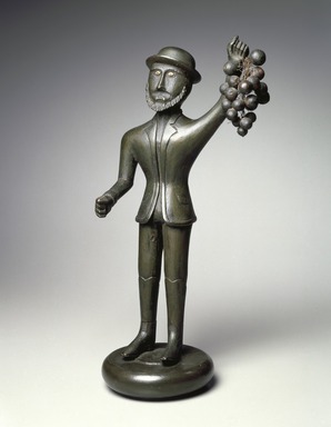 Unknown. <em>Figure of Man with Grapes</em>, ca. 1860. Wood, metal wire, bone, 16 1/2 x 7 1/2 x 5 1/4 in. (41.9 x 19.1 x 13.3 cm). Brooklyn Museum, Gift of The Guennol Collection, 2000.80. Creative Commons-BY (Photo: , 2000.80_SL3.jpg)