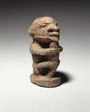 Sapi. <em>Figure of a Man Holding a Crocodile</em>, 15th century or earlier. Stone, 4 x 1 1/2 x 2 1/4 in.  (10.2 x 3.8 x 5.7 cm). Brooklyn Museum, Purchased with funds given by the Noah-Sadie K. Wachtel Foundation, Inc., 2000.93.1. Creative Commons-BY (Photo: Brooklyn Museum, 2000.93.1_SL1_edited.jpg)