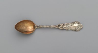 Unknown. <em>Souvenir Coffee Spoon (Brooklyn Bridge)</em>. Silver with gold wash to bowl, 4 x 7/8 x 5/8 in. (10.2 x 2.2 x 1.6 cm). Brooklyn Museum, Gift in memory of Harry and Marian R. Lipton presented on behalf of their great-grandchildren, Elissa H. Samet, Brandon R. Derringer, Jeremy A. Derringer, and Justin M. Derringer, 2001.130.10. Creative Commons-BY (Photo: Brooklyn Museum, 2001.130.10_PS1.jpg)
