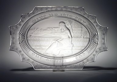  <em>Platter (Cleopatra)</em>, late 19th century. Glass, 1 3/8 x 13 1/4 x 8 5/8 in. (3.5 x 33.7 x 21.9 cm). Brooklyn Museum, Gift of Richard Fazzini and Mary McKercher, 2001.53. Creative Commons-BY (Photo: Brooklyn Museum, 2001.53_transp5208.jpg)