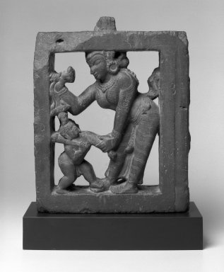  <em>Yashoda and Krishna</em>, ca. 12th century. Black stone, 14 5/8 x 11 3/8 in.  (37.1 x 28.9 cm). Brooklyn Museum, Gift of Dr. Bertram H. Schaffner, 2001.83. Creative Commons-BY (Photo: Brooklyn Museum, 2001.83_side1_bw.jpg)