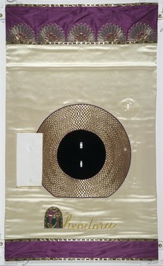 Judy Chicago (American, born 1939). <em>Theodora Place Setting</em>, 1974-1979. Runner: Cotton/linen base fabric, woven interface support material (horsehair, wool, and linen), cotton twill tape, silk satin fabric, silk, synthetic gold cord, colored silk couching threads, velvet, silk faille fabric, silk thread
Plate: Porcelain with overglaze enamel (China paint) and gold glaze, Runner: 50 3/4 x 30 3/8 in. (128.9 x 77.2 cm). Brooklyn Museum, Gift of The Elizabeth A. Sackler Foundation, 2002.10-PS-16. © artist or artist's estate (Photo: , 2002.10-PS-16_runner_PS1.jpg)
