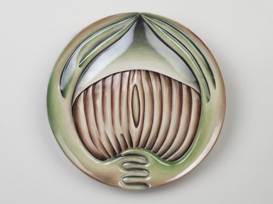 Judy Chicago (American, born 1939). <em>Hrosvitha Place Setting</em>, 1974-1979. Runner: Cotton/linen base fabric, unbleached linen, felt backing, woven interface support material (horsehair, wool, and linen), cotton twill tape, silk, synthetic gold cord, cotton sateen fabric, homemade cords, felt, thread
Plate: Porcelain with overglaze enamel (China paint), Runner: 52 3/8 x 30 1/2 in. (133 x 77.5 cm). Brooklyn Museum, Gift of The Elizabeth A. Sackler Foundation, 2002.10-PS-17. © artist or artist's estate (Photo: Brooklyn Museum, 2002.10-PS-17_plate_PS9.jpg)