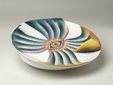 Judy Chicago (American, born 1939). <em>Caroline Herschel Place Setting</em>, 1974–1979. Runner: Cotton/linen fabric, woven interface support material (horsehair, wool, and linen), cotton twill tape, silk, synthetic gold cord, wool, wool yarn, thread
Plate: Porcelain with overglaze enamel (China paint), Runner: 51 3/8 x 30 in. (130.5 x 76.2 cm). Brooklyn Museum, Gift of The Elizabeth A. Sackler Foundation, 2002.10-PS-29. © artist or artist's estate (Photo: Brooklyn Museum, 2002.10-PS-29_threequarter_PS9.jpg)