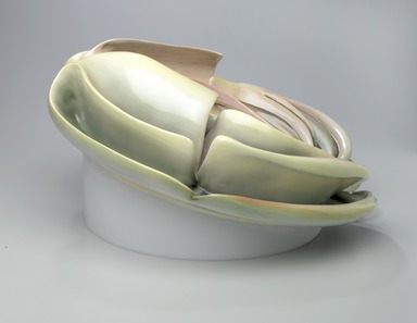 Judy Chicago (American, born 1939). <em>Virginia Woolf Place Setting</em>, 1974-1979. Runner: Cotton/linen base fabric, woven interface support material (horsehair, wool, and linen), cotton twill tape, silk, synthetic gold cord, airbrushed acrylic paint, silk chiffon, silk embroidery thread,
Plate: Porcelain with overglaze enamel (China paint), Runner: 52 x 30 1/8 in. (132.1 x 76.5 cm). Brooklyn Museum, Gift of The Elizabeth A. Sackler Foundation, 2002.10-PS-38. © artist or artist's estate (Photo: , 2002.10-PS-38_plate_view3_PS1.jpg)