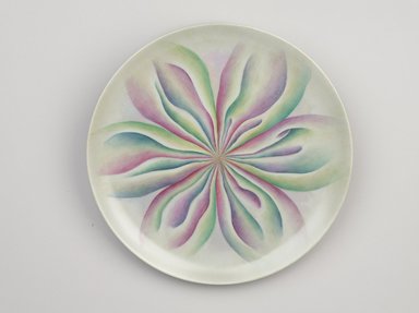Judy Chicago (American, born 1939). <em>Sophia Place Setting</em>, 1974–1979. Runner: Cotton/linen base fabric, woven interface support material (horsehair, wool, and linen), cotton twill tape, silk, synthetic gold cord, silk chiffon, net
Plate:Porcelain with overglaze enamel (China paint), rainbow overglaze, Runner: 51 1/8 x 30 1/8 in. (129.9 x 76.5 cm). Brooklyn Museum, Gift of The Elizabeth A. Sackler Foundation, 2002.10-PS-6. © artist or artist's estate (Photo: Brooklyn Museum, 2002.10-PS-6_plate_PS9.jpg)