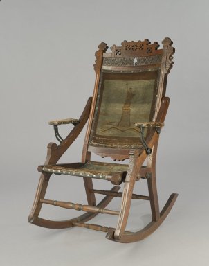 Attributed to Edward W. Vaill (1861–1891). <em>Rocking Chair</em>, ca. 1880. Wood, original woven upholstery, and metal, 39 3/4 x 23 7/8 x 30 1/2 in. (101 x 60.6 x 77.5 cm). Brooklyn Museum, Gift of Dr. Alvin E. Friedman-Kien, 2002.107.3. Creative Commons-BY (Photo: Brooklyn Museum, 2002.107.3_PS6.jpg)