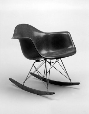 Charles Eames (American, 1907–1978). <em>Rocker</em>, ca. 1950. Fiberglass, wood, metal, rubber, 26 1/2 x 24 3/4 x 27 1/8 in. (67.3 x 62.9 x 68.9 cm). Brooklyn Museum, Gift of Dr. Alvin E. Friedman-Kien, 2002.107.4. Creative Commons-BY (Photo: Brooklyn Museum, 2002.107.4_bw.jpg)