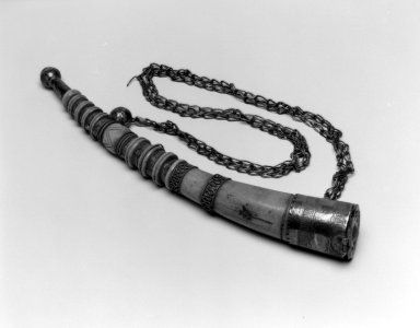 Mende. <em>Pendant and Chain</em>, late 19th century. Elephant ivory, silver, pendant: 12 x 2 in.  (30.5 x 5.1 cm);. Brooklyn Museum, Gift of Blake Robinson, 2002.31.11a-b. Creative Commons-BY (Photo: Brooklyn Museum, 2002.31.11a-b_bw.jpg)