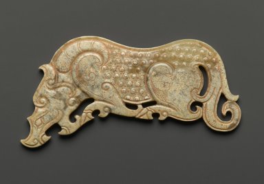  <em>Mythical Tiger Pendant</em>, 20th century. Nephrite, 4 1/16 x 2 x 1 1/16 in. (10.3 x 5.1 x 2.7 cm). Brooklyn Museum, Gift of Mr. and Mrs. Raymond Hargreaves, 2002.36.2. Creative Commons-BY (Photo: Brooklyn Museum, 2002.36.2_side1_PS2.jpg)
