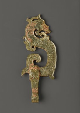  <em>Garment Hook</em>, 20th century. Olive green nephrite, 4 7/8 x 2 x 1/2 in. (12.4 x 5.1 x 1.3 cm). Brooklyn Museum, Gift of Mr. and Mrs. Raymond Hargreaves, 2002.36.4. Creative Commons-BY (Photo: Brooklyn Museum, 2002.36.4_front_PS2.jpg)
