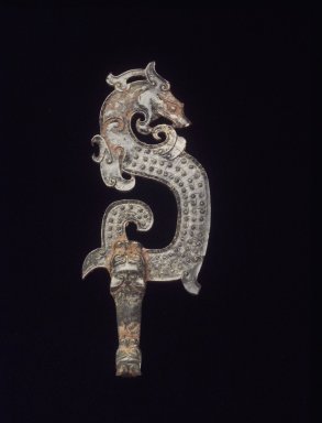 <em>Garment Hook</em>, 20th century. Olive green nephrite, 4 7/8 x 2 x 1/2 in. (12.4 x 5.1 x 1.3 cm). Brooklyn Museum, Gift of Mr. and Mrs. Raymond Hargreaves, 2002.36.4. Creative Commons-BY (Photo: Brooklyn Museum, 2002.36.4_transp5687.jpg)