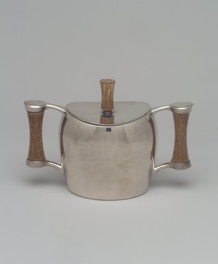 Niagra Falls Silver Co., a Division of Oneida Silversmiths (1877 to present). <em>Sugar Bowl and Lid, from Three Piece Coffee Service, Heirloom Line</em>, ca. 1955. Silverplate, wood, 4 1/4 x 6 1/4 x 3 1/8 in. (10.8 x 15.9 x 7.9 cm). Brooklyn Museum, Gift of Jewel Stern, 2003.11.4a-b. Creative Commons-BY (Photo: Brooklyn Museum, 2003.11.4a-b.jpg)