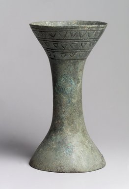  <em>Drum</em>, 7th century B.C.E. Bronze, 9 x 5 7/8 in. (22.9 x 14.9 cm). Brooklyn Museum, Anonymous gift, 2003.82.1. Creative Commons-BY (Photo: Brooklyn Museum, 2003.82.1.jpg)