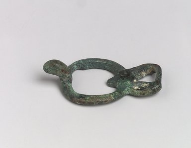  <em>Belt Buckle with Heads of a Bird and a Deer</em>, 6th-4th century B.C.E. Bronze, 2 x 1 x 1/2 in. (5.1 x 2.5 x 1.3 cm). Brooklyn Museum, Anonymous gift, 2003.82.11. Creative Commons-BY (Photo: Brooklyn Museum, 2003.82.11.jpg)