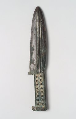  <em>Dagger with Curved and Straight Edges</em>, 6th-4th century B.C.E. Bronze, 9 5/16 x 1 7/8 x 5/16 in. (23.7 x 4.8 x 0.8 cm). Brooklyn Museum, Anonymous gift, 2003.82.3. Creative Commons-BY (Photo: Brooklyn Museum, 2003.82.3.jpg)