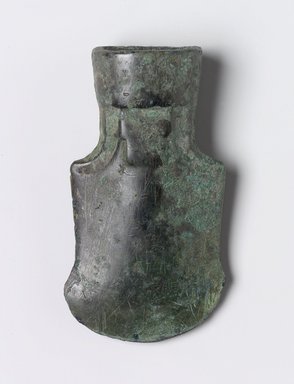  <em>Axe</em>, 7th-6th century B.C.E. Bronze, 3 3/4 x 2 1/4 x 1 1/8 in. (9.5 x 5.7 x 2.9 cm). Brooklyn Museum, Anonymous gift, 2003.82.7. Creative Commons-BY (Photo: Brooklyn Museum, 2003.82.7.jpg)