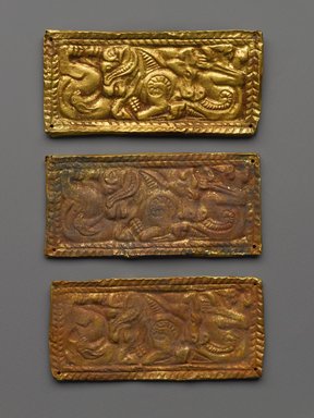 <em>Rectangular Plaques (3)</em>. Gold, 1 3/4 x 3 7/8 in. (4.5 x 9.8 cm). Brooklyn Museum, Gift of Dr. Alvin E. Friedman-Kien, 2004.112.4a-c. Creative Commons-BY (Photo: Brooklyn Museum, 2004.112.4a-c_front_PS4.jpg)