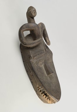 Loma. <em>Horizontal Mask (Okobuzogui)</em>, early 20th century. Wood, clay, copper alloy, 40 x 14 1/2 x 10 in. (101.6 x 36.8 x 25.4 cm). Brooklyn Museum, A. Augustus Healy Fund and Designated Purchase Fund, 2004.1. Creative Commons-BY (Photo: Brooklyn Museum, 2004.1_PS6.jpg)