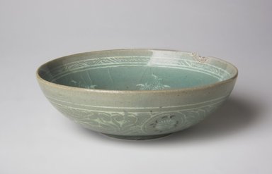  <em>Bowl</em>, 13th century. Stoneware with celadon glaze and inlaid black and white slip, Height: 1 3/4 in. (4.4 cm). Brooklyn Museum, The Peggy N. and Roger G. Gerry Collection, 2004.28.130. Creative Commons-BY (Photo: , 2004.28.130_top_PS11.jpg)