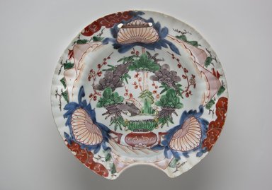  <em>Barber's Bowl</em>, late 18th century. Arita ware, porcelain with underglaze blue and overglaze enamel, 3 1/4 x 9 3/4 in. (8.2 x 24.8 cm). Brooklyn Museum, The Peggy N. and Roger G. Gerry Collection, 2004.28.266. Creative Commons-BY (Photo: Brooklyn Museum, 2004.28.266_top_PS11.jpg)