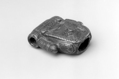 Dan. <em>Pendant</em>, 19th century. Copper alloy
, 2 x 1 7/8 x 5/8 in. (5.1 x 4.8 x 1.6 cm). Brooklyn Museum, Gift of Blake Robinson, 2004.52.3. Creative Commons-BY (Photo: Brooklyn Museum, 2004.52.3_bw.jpg)
