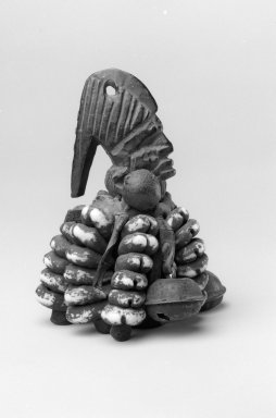 Yorùbá. <em>Image for Trickster (Ogo Elegba)</em>, 19th century. Wood, leather, cowrie shell, copper alloy
, 3 1/2 x 2 3/16 x 2 7/16 in. (8.9 x 5.6 x 6.2 cm). Brooklyn Museum, Gift of Blake Robinson, 2004.52.5. Creative Commons-BY (Photo: Brooklyn Museum, 2004.52.5_bw.jpg)