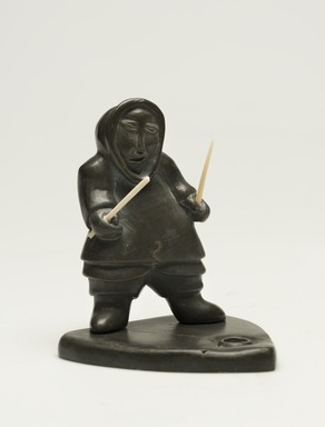 Lucassie Nowra (1924-1993). <em>Standing Male on Base</em>, 1950-1993. Soapstone, ivory, 4 1/4 x 3 3/8 x 3 1/4 in. (10.8 x 8.6 x 8.3 cm). Brooklyn Museum, Hilda and Al Schein Collection, 2004.79.10. Creative Commons-BY (Photo: Brooklyn Museum, 2004.79.10_threequarter_right_PS11-1.jpg)
