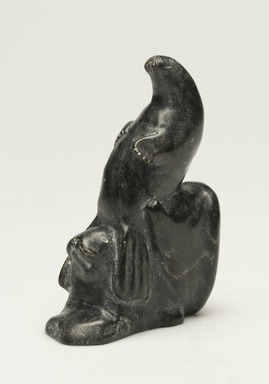 Bobby Qajuurtaq Tarkirk (Canadian, Inuit, 1934-2000). <em>Two Seals and a Human Head</em>, 1950-1980. Soapstone, 3 1/2 x 1 1/4 x 2 3/4 in. (8.9 x 3.2 x 7 cm). Brooklyn Museum, Hilda and Al Schein Collection, 2004.79.16. Creative Commons-BY (Photo: Brooklyn Museum, 2004.79.16_threequarter_right_PS11-1.jpg)