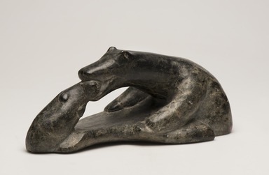 Inuit. <em>Polar Bear Eating a Seal</em>, 1950-1980. Soapstone, 4 3/8 x 25 3/4 x 5 1/4 in. (11.1 x 65.4 x 13.3 cm). Brooklyn Museum, Hilda and Al Schein Collection, 2004.79.22. Creative Commons-BY (Photo: Brooklyn Museum, 2004.79.22_threequarter_right_PS11-1.jpg)