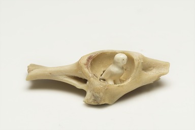 Inuit. <em>Bird in Nest</em>, 1950-1980. Ivory, bone joint, 1 1/2 x 4 1/8 x 2 1/2 in. (3.8 x 10.5 x 6.4 cm). Brooklyn Museum, Hilda and Al Schein Collection, 2004.79.46. Creative Commons-BY (Photo: Brooklyn Museum, 2004.79.46_view01_PS11-1.jpg)