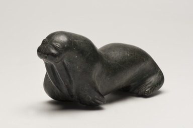 Davide Kasuolvak (born 1913). <em>Walrus</em>, 1950-1980. Soapstone, ivory, 3 1/4 x 3 x 6 3/4 in. (8.3 x 7.6 x 17.1 cm). Brooklyn Museum, Hilda and Al Schein Collection, 2004.79.7. Creative Commons-BY (Photo: Brooklyn Museum, 2004.79.7_threequarter_right_PS11-1.jpg)