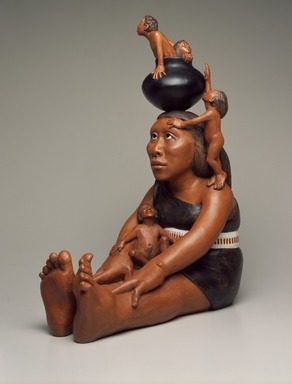 Roxanne Swentzell (Kah'p'oo Owinge (Santa Clara Pueblo), born 1962). <em>Making Babies for Indian Market</em>, 2004. Clay, pigment, 23 1/2 x 8 1/2 x 17 in. (59.7 x 21.6 x 43.2 cm). Brooklyn Museum, Gift in memory of Helen Thomas Kennedy, 2004.80. © artist or artist's estate (Photo: Brooklyn Museum, 2004.80_SL3.jpg)