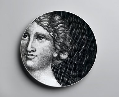 Piero Fornasetti (Italian, 1913–1988). <em>Plate, Eva</em>, ca. 1954. Glazed earthenware, 1 x 10 1/4 x 10 1/4 in. (2.5 x 26 x 26 cm). Brooklyn Museum, Gift of the Estate of Jane Adams Breed, 2005.37.19. Creative Commons-BY (Photo: Brooklyn Museum, 2005.37.19_PS2.jpg)