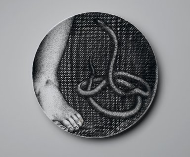 Piero Fornasetti (Italian, 1913-1988). <em>Plate, Eva</em>, ca. 1954. Glazed earthenware, 1 x 10 1/4 x 10 1/4 in. (2.5 x 26 x 26 cm). Brooklyn Museum, Gift of the Estate of Jane Adams Breed, 2005.37.9. Creative Commons-BY (Photo: Brooklyn Museum, 2005.37.9_PS2.jpg)