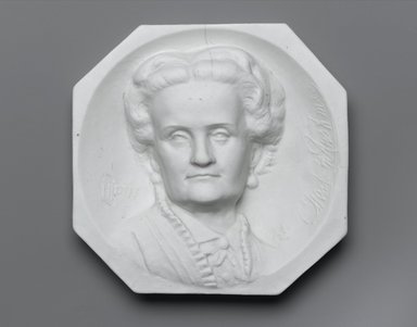 Karl L. H. Müller (American, born Germany, 1820-1887). <em>Plaque, Portrait of Charlotte Cushman</em>, ca. 1876. Unglazed porcelain, 5 3/4 x 5 7/8 x 1 1/2 in. (14.6 x 14.9 x 3.8 cm). Brooklyn Museum, Gift of Joseph F. McCrindle, by exchange, 2006.6.2. Creative Commons-BY (Photo: Brooklyn Museum, 2006.6.2_PS1.jpg)