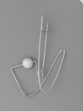 Claire Falkenstein (American, 1908–1997). <em>Brooch</em>, ca. 1948. Nickel, plastic, 5 x 3 x 1 in. (12.7 x 7.6 x 2.5 cm). Brooklyn Museum, H. Randolph Lever Fund, 2007.21.5. Creative Commons-BY (Photo: Brooklyn Museum, 2007.21.5_PS9.jpg)