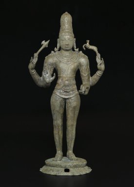  <em>Shiva as Chandrashekhara</em>, ca. 970 C.E. Bronze, 25 3/4 x 12 x 7 3/4 in., 50.5 lb. (65.4 x 30.5 x 19.7 cm, 22.91kg). Brooklyn Museum, Gift of the Asian Art Council in honor of Amy G. Poster; additional funding from bequest of Dr. Samuel Eilenberg, by exchange; Bertram H. Schaffner Asian Art Fund; and gift of Dr. Andrew Dahl, David Ellis, Benjamin S. Faber, Martha M. Green, Dr. and Mrs. Eugene Halpert, Stanley J. Love, Anthony A. Manheim, Mabel Reiner, and Chi Tiew-lui, by exchange
, 2007.2. Creative Commons-BY (Photo: Brooklyn Museum, 2007.2_front_PS2.jpg)