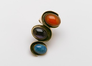 Art Smith (American, born Cuba, 1917-1982). <em>Undulation Ring</em>, ca. 1961. Gold, chrysocola, amethyst, carnelian, 1 1/4 x 2 3/8 x 1 1/8 in. (3.2 x 6 x 2.9 cm). Brooklyn Museum, Gift of Charles L. Russell, 2007.61.12. Creative Commons-BY (Photo: Brooklyn Museum, 2007.61.12_PS2.jpg)