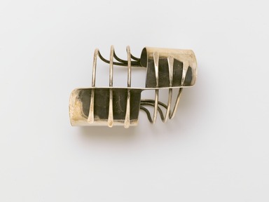 Art Smith (American, born Cuba, 1917–1982). <em>"Modern Cuff" Bracelet</em>, designed ca. 1948. Silver, 1 5/8 x 2 1/2 x 4 in. (4.1 x 6.4 x 10.2 cm). Brooklyn Museum, Gift of Charles L. Russell, 2007.61.15. Creative Commons-BY (Photo: Brooklyn Museum, 2007.61.15_PS2.jpg)