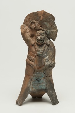 Maya. <em>Whistle in the Form of a Male Figure Wearing a Jaguar Mask</em>, 500-850. Ceramic, pigment, 8 x 3 1/2 x 2 in. (20.3 x 8.9 x 5.1 cm). Brooklyn Museum, Gift in memory of Frederic Zeller, 2009.2.14. Creative Commons-BY (Photo: Brooklyn Museum, 2009.2.14_overall_PS11.jpg)