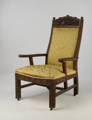 Lockwood de Forest (American, 1850–1932). <em>Armchair</em>, ca. 1895. Teak, old but not original textile, metal, 47 1/8 x 26 x 29 1/2 in. (119.7 x 66 x 74.9 cm). Brooklyn Museum, Gift of Lisa M. Price, by exchange and H. Randolph Lever Fund, 2009.72. Creative Commons-BY (Photo: Brooklyn Museum, 2009.72_PS6.jpg)