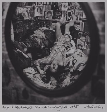 Arthur Tress (American, born 1940). <em>Augusto Machato with Cinemabilia, NY</em>, 1975. Gelatin silver photograph, 11 x 14 in. (27.9 x 35.6 cm). Brooklyn Museum, Gift of William and Marilyn Braunstein, 2009.86.15. © artist or artist's estate (Photo: Brooklyn Museum, 2009.86.15_PS20.jpg)