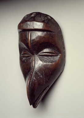 Dan. <em>Mask with Bird Beak</em>, late 19th century. Wood, 9 5/8 x 5 3/8 x 4 3/4 in. (24.4 x 13.7 x 12.1 cm). Brooklyn Museum, Collection of Beatrice Riese, 2011.4.10. Creative Commons-BY (Photo: Brooklyn Museum, 2011.4.10.jpg)