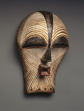 Songye. <em>Mask (Kifwebe)</em>, late 19th or early 20th century. Wood, pigment, 12 x 7 1/8 x 6 1/8 in. (30.5 x 18.1 x 15.6 cm). Brooklyn Museum, Collection of Beatrice Riese, 2011.4.2. Creative Commons-BY (Photo: Brooklyn Museum, 2011.4.2_threequarter_SL1_edited.jpg)