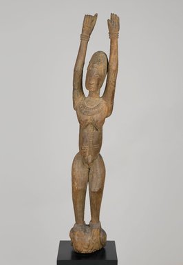 Dogon. <em>Female Figure Standing with Arms Raised</em>, 16th to 19th century. Wood, without separate base: 47 3/4 x 7 1/4 x 8 11/16 in. (121.3 x 18.4 x 22 cm). Brooklyn Museum, Collection of Beatrice Riese, 2011.4.5. Creative Commons-BY (Photo: Brooklyn Museum, 2011.4.5_PS2.jpg)