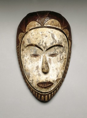 Fang (Betsi subgroup) artist. <em>Face mask (ñgontang)</em>, late 19th century. Wood, kaolin, pigment, 11 1/8 x 7 x 2 1/4 in. (28.3 x 17.8 x 5.7 cm). Brooklyn Museum, Collection of Beatrice Riese, 2011.4.6. Creative Commons-BY (Photo: Brooklyn Museum, 2011.4.6_SL1_edited.jpg)